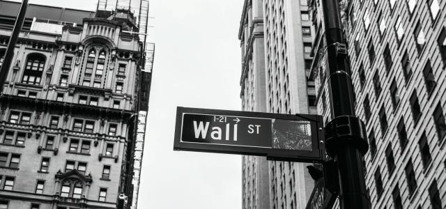 grayscale photo of 1-21 Wall street signage by Chris Li courtesy of Unsplash.